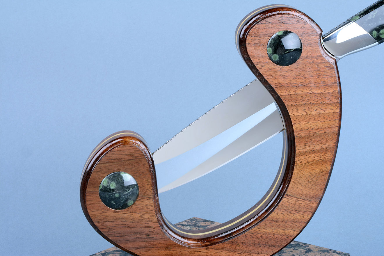 "Concordia" obverse side view in 440C high chromium stainless steel blade, 304 stainless steel bolsters, Nebula Stone gemstone handle, stand of American Black Walnut, Poplar, Nebula Stone, Baltic Brown granite