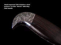 "Morta" in twist damascus welded blade, hand-engraved 304 stainless steel bolsters, ancient Bog Oak handle, hand-carved, hand-dyed leather sheath, hand-cast bronze stands