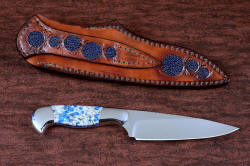 "Andromeda" reverse side view in T3 deep cryogenically treated CPM 154CM powder metal technology high molybdenum stainless steel blade, 304 stainless steel bolsters, K2 Azurite Granite gemstone handle, hand-carved leather sheath inlaid with blue rayskin