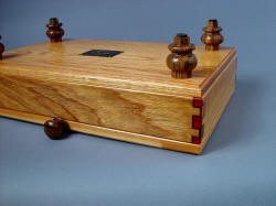 "Chef's Set" corner, base, feet detail, bottom view. Hand-turned bocote hardwood is tough, hard, and durable. Red oak base is solid and strong