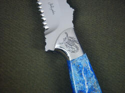 "PJLT" custom handmade knife, obverse side front bolster engraving detail. Fine line engraving in high chromium high nickel stainless steel for longevity, high corrosion resistance