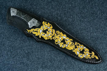 "Patriot" sheathed view in CPM154CM high molybdenum powder metal technology martensitic stainless steel blade, hand-engraved 304 stainless steel bolsters, Golden Midnight Agate gemstone handle, laser carved,  hand-dyed leather sheath