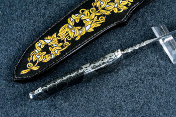 "Patriot" spine edgework, filework view in CPM154CM high molybdenum powder metal technology martensitic stainless steel blade, hand-engraved 304 stainless steel bolsters, Golden Midnight Agate gemstone handle, laser carved,  hand-dyed leather sheath