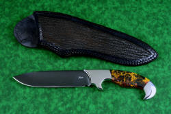 "Quetzal" (with reflector above), obverse side view, in deep cryogencially treated, hot blued O1 high carbon tungsten-vanadium tool steel blade, 304 stainless steel bolsters, Pilbara Picasso Jasper and Red River Jasper gemstone handle, hand-carved leather sheath inlaid with shark skin