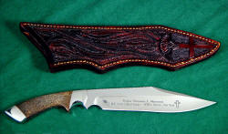 Veteran's knife honoring Major Thomas Shuman: veteran of three wars. Etched 440C high chromium stailess steel blade, 304 stainless steel bolsters, petrified dinosaur bone gemstone handle, hand-carved leather sheath