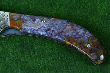 Rio Grande Agate is hard and tough enough to support machine screws on a folding knife Rio Grande Agate is hard and tough enough to support machine screws on a folding knife