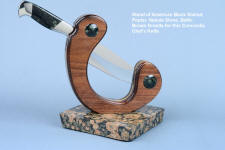 "Concordia" in 440C high chromium stainless steel blade, 304 stainless steel bolsters, Nebula Stone gemstone handle, stand of American Black Walnut, Poplar, Nebula Stone, Baltic Brown granite